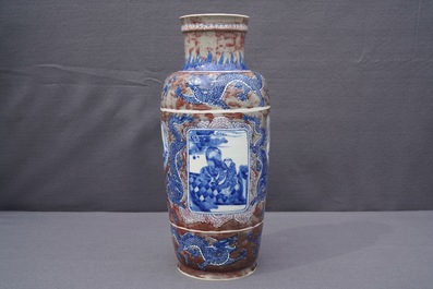 A rare Chinese blue, white and underglaze red rouleau vase, Kangxi